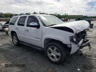 2007 Chevrolet Tahoe LTZ z VIN 1GNFC13J07R177477, wystawiony jako Copart lot #56707715 z przebiegiem 222 879 mil mil oraz Szkoda całkowita • Salvage title. Historia ofert i sprzedaży dostępna na DreamBid. Obrazek 4.