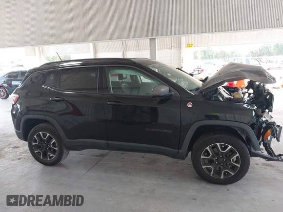 2020 Jeep Compass Trailhawk with VIN 3C4NJDDB3LT170463, listed as a IAAI auction lot 42446080 with 83,336 mi miles and . Bid and sale history available at DreamBid. Image 14.
