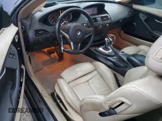 2008 BMW 6 Series 650i z VIN WBAEA53518CV90157, wystawiony jako Copart lot #82015684 z przebiegiem 170 898 mil mil oraz Czysty tytuł • Clean title. Historia ofert i sprzedaży dostępna na DreamBid. Obrazek 8.