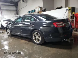 2013 Ford Taurus SEL with VIN 1FAHP2E93DG167733, listed as a Copart auction lot 80792654 with 266,100 mi miles and Salvage Title. Bid and sale history available at DreamBid. Image 2.