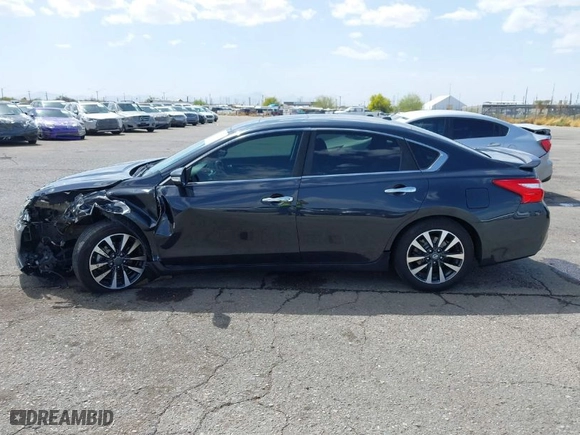 2016 Nissan Altima 2.5 S with VIN 1N4AL3AP8GC133418, listed as a IAAI auction lot 41932707 with 104,830 mi miles. Bid and sale history available at carsss.com. Image 14.