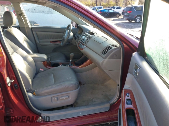 2004 Toyota Camry LE with VIN 4T1BF32K04U074049, listed as a IAAI auction lot 41768724 with 262,296 mi miles and . Bid and sale history available at DreamBid. Image 5.