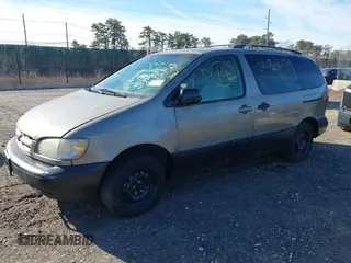 1999 Toyota Sienna LE with VIN 4T3ZF13CXXU121819, listed as a IAAI auction lot 41607624 with 999,999 mi miles. Bid and sale history available at carsss.com. Image 2.