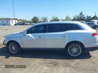2015 Lincoln MKT EcoBoost with VIN 2LMHJ5AT4FBL00959, listed as a IAAI auction lot 41991763 with 159,687 mi miles and . Bid and sale history available at DreamBid. Image 14.