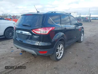 2015 Ford Escape Titanium with VIN 1FMCU9J96FUC11476, listed as a IAAI auction lot 41967914 with 149,341 mi miles. Bid and sale history available at carsss.com. Image 4.