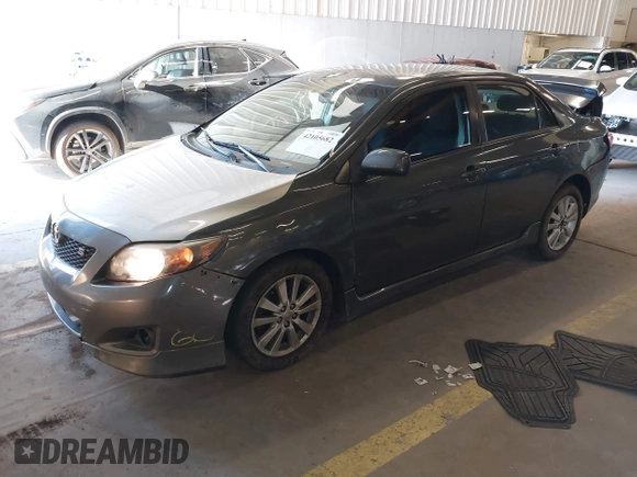 2010 Toyota Corolla with VIN 1NXBU4EE2AZ199308, listed as a IAAI auction lot 42105682 with 206,800 mi miles and . Bid and sale history available at DreamBid. Image 2.