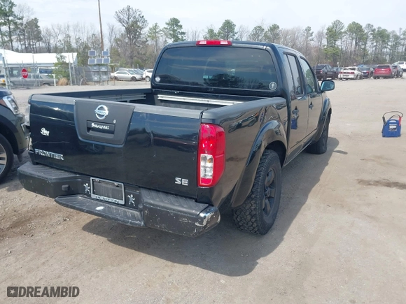 2009 Nissan Frontier SE with VIN 1N6AD07U89C405310, listed as a IAAI auction lot 41920771 with 271,894 mi miles. Bid and sale history available at carsss.com. Image 4.