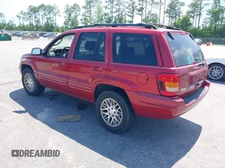 2004 Jeep Grand Cherokee Limited with VIN 1J4GX58N34C401838, listed as a IAAI auction lot 42714681 with 205,477 mi miles and . Bid and sale history available at DreamBid. Image 3.