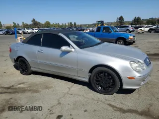 2005 Mercedes-Benz CLK 320 with VIN WDBTK65J55F140026, listed as a Copart auction lot 61972045 with 152,200 mi miles and Salvage title. Bid and sale history available at DreamBid. Image 4.