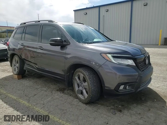 2020 Honda Passport Touring z VIN 5FNYF8H9XLB007336, wystawiony jako Copart lot #51012975 z przebiegiem 74 620 mil mil oraz Szkoda całkowita • Salvage title. Historia ofert i sprzedaży dostępna na DreamBid. Obrazek 14.