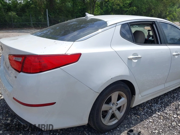 2014 Kia Optima LX with VIN 5XXGM4A74EG317632, listed as a IAAI auction lot 42172027 with 122,879 mi miles and . Bid and sale history available at DreamBid. Image 6.