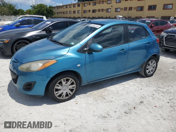 2011 Mazda 2 Sport with VIN JM1DE1HY0B0122590, listed as a Copart auction lot 56162515 with 140,847 mi miles and Clean Title. Bid and sale history available at DreamBid. Image 1.