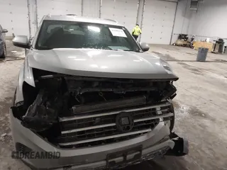 2021 Volkswagen Atlas SE z VIN 1V2HE2CA9MC219076, wystawiony jako IAAI lot #41608670 z przebiegiem 56 162 mil mil oraz . Historia ofert i sprzedaży dostępna na DreamBid. Obrazek 6.