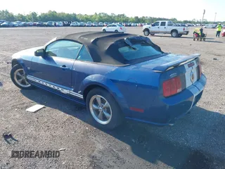 2006 Ford Mustang GT Deluxe with VIN 1ZVFT85H465215338, listed as a IAAI auction lot 42035867 with 124,381 mi miles. Bid and sale history available at carsss.com. Image 3.