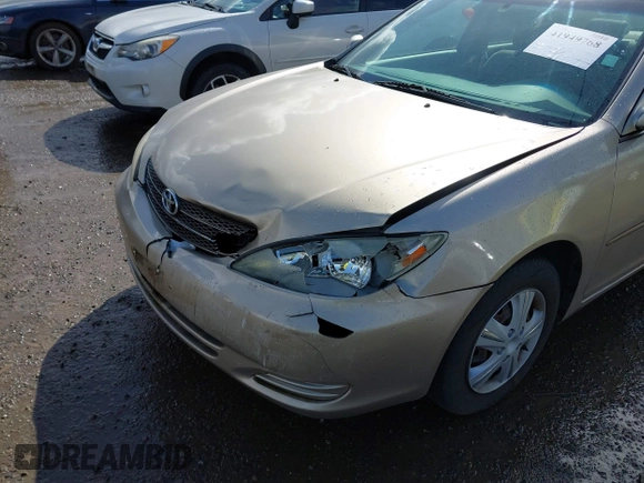 2004 Toyota Camry LE with VIN JTDBE32K440272373, listed as a IAAI auction lot 41949768 with 205,093 mi miles. Bid and sale history available at carsss.com. Image 6.