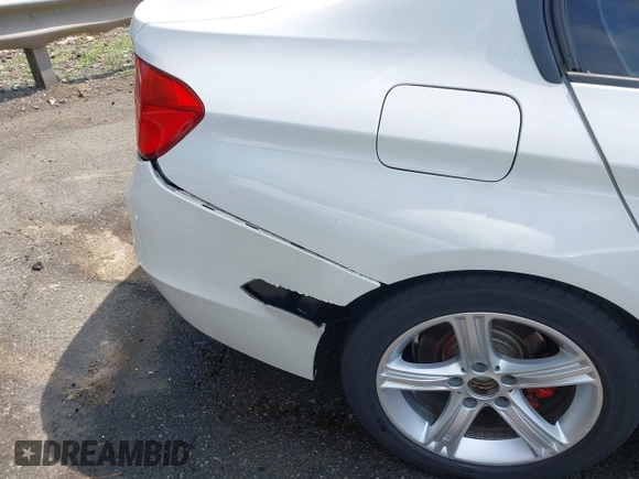 2014 BMW 3 Series 328i with VIN WBA3C1C5XEK107826, listed as a IAAI auction lot 42481701 with 104,151 mi miles and . Bid and sale history available at DreamBid. Image 17.