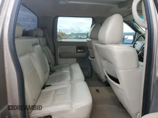 2004 Ford F-150 XLT with VIN 1FTPW14564KD21754, listed as a Copart auction lot 59007395 with 171,537 mi miles and Salvage title. Bid and sale history available at DreamBid. Image 10.