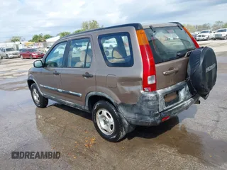 2003 Honda CR-V LX with VIN JHLRD68513C009276, listed as a IAAI auction lot 41563452 with 240,519 mi miles and . Bid and sale history available at DreamBid. Image 3.