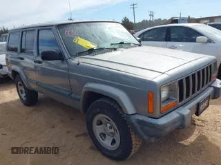 2000 Jeep Cherokee z VIN 1J4FT48S6YL142159, wystawiony jako IAAI lot #41677328 z przebiegiem 107 154 mil mil oraz . Historia ofert i sprzedaży dostępna na DreamBid. Obrazek 1.