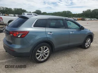 2013 Mazda CX-9 Grand Touring with VIN JM3TB3DA2D0400652, listed as a Copart auction lot 64034265 with 104,339 mi miles and Clean title. Bid and sale history available at DreamBid. Image 3.