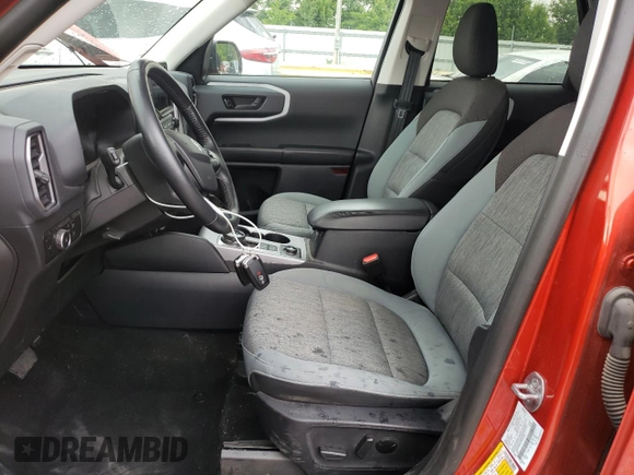 2023 Ford Bronco Sport Big Bend with VIN 3FMCR9B64PRD44560, listed as a Copart auction lot 59221115 with 24,837 mi miles and Salvage title. Bid and sale history available at DreamBid. Image 7.