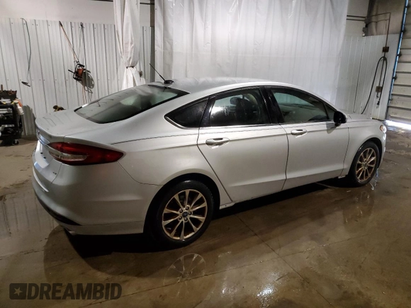 2017 Ford Fusion SE with VIN 3FA6P0H75HR333366, listed as a Copart auction lot 75401434 with 36,906 mi miles and Salvage Title. Bid and sale history available at DreamBid. Image 3.