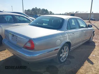 2004 Jaguar XJ with VIN SAJEA71C94SG01362, listed as a IAAI auction lot 41829470 with 172,545 mi miles. Bid and sale history available at carsss.com. Image 4.
