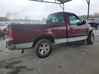 1999 Ford F-150 XL with VIN 2FTRF17L0XCB19827, listed as a Copart auction lot 85282164 with 52,103 mi miles and Salvage title. Bid and sale history available at DreamBid. Image 3.