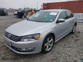 2015 Volkswagen Passat 1.8T Wolfsburg Ed with VIN 1VWAT7A34FC113127, listed as a IAAI auction lot 41211174 with 97,504 mi miles. Bid and sale history available at carsss.com. Image 18.