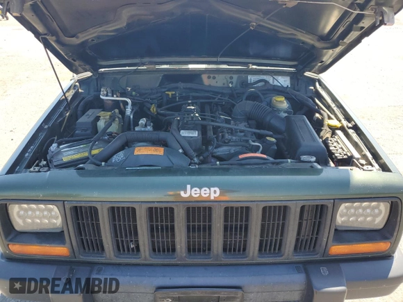 1998 Jeep Cherokee Sport with VIN 1J4FJ68S5WL108020, listed as a Copart auction lot 60150655 with 290,595 mi miles and Salvage title. Bid and sale history available at DreamBid. Image 12.
