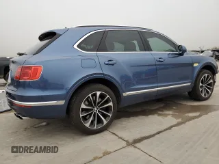 2019 Bentley Bentayga V8 z VIN SJAAM2ZV5KC024865, wystawiony jako Copart lot #42869533 z przebiegiem 23 687 mil mil oraz . Historia ofert i sprzedaży dostępna na DreamBid. Obrazek 3.