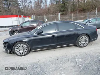 2015 Audi A8 L 4.0T with VIN WAU32AFD7FN006233, listed as a IAAI auction lot 41353034 with 119,693 mi miles. Bid and sale history available at carsss.com. Image 14.