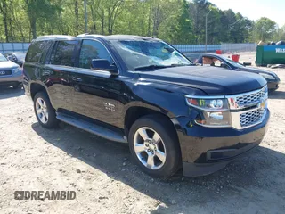 2015 Chevrolet Tahoe LT with VIN 1GNSCBKC8FR268891, listed as a IAAI auction lot 41964602 with 175,035 mi miles and . Bid and sale history available at DreamBid. Image 1.