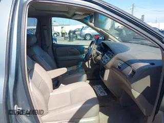 1999 Toyota Sienna LE with VIN 4T3ZF13C5XU099020, listed as a IAAI auction lot 41709287 with 206,884 mi miles. Bid and sale history available at carsss.com. Image 5.