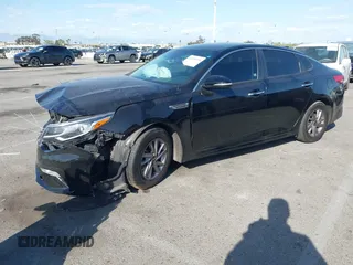 2020 Kia Optima LX with VIN 5XXGT4L37LG418495, listed as a IAAI auction lot 41920399 with 71,190 mi miles and . Bid and sale history available at carsss.com. Image 17.