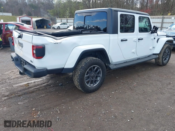 2020 Jeep Gladiator Overland with VIN 1C6HJTFG1LL107641, listed as a IAAI auction lot 41847586 with 69,664 mi miles and . Bid and sale history available at DreamBid. Image 4.