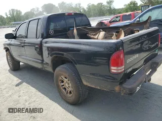 2003 Dodge Dakota z VIN 1D7HG38Z13S220152, wystawiony jako Copart lot #54314515 z przebiegiem Nie podano mil oraz Szkody całkowita. Historia ofert i sprzedaży dostępna na DreamBid. Obrazek 2.
