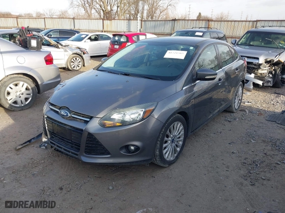 2012 Ford Focus Titanium with VIN 1FAHP3J2XCL421412, listed as a IAAI auction lot 41721565 with 117,632 mi miles. Bid and sale history available at carsss.com. Image 2.