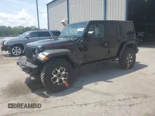 2022 Jeep Wrangler Unlimited Rubicon with VIN 1C4HJXFG1NW193437, listed as a Copart auction lot 57137365 with 56,732 mi miles and Salvage title. Bid and sale history available at DreamBid. Image 1.
