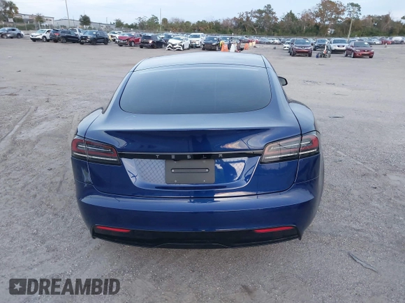 2023 Tesla Model S with VIN 5YJSA1E53PF518986, listed as a IAAI auction lot 41223046 with 22,204 mi miles and . Bid and sale history available at DreamBid. Image 17.