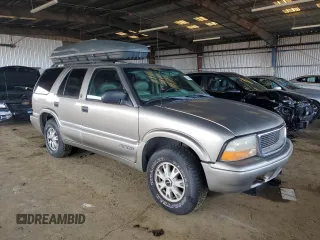 2000 GMC Jimmy SLE Convenience with VIN 1GKDT13W7Y2384460, listed as a Copart auction lot 85545254 with 165,787 mi miles and Clean Title. Bid and sale history available at carsss.com. Image 4.