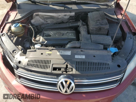 2012 Volkswagen Tiguan SE with VIN WVGAV7AX9CW003857, listed as a Copart auction lot 58356295 with 202,794 mi miles and Salvage title. Bid and sale history available at DreamBid. Image 12.