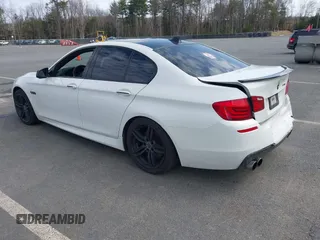 2013 BMW 5 Series 535i xDrive with VIN WBAFU7C51DDU68586, listed as a IAAI auction lot 41939159 with 111,496 mi miles and . Bid and sale history available at carsss.com. Image 3.