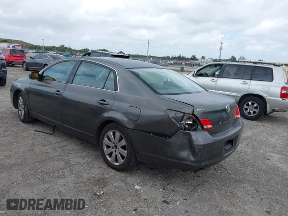 2007 Toyota Avalon XL with VIN 4T1BK36B77U213734, listed as a IAAI auction lot 41956181 with 223,857 mi miles. Bid and sale history available at carsss.com. Image 3.