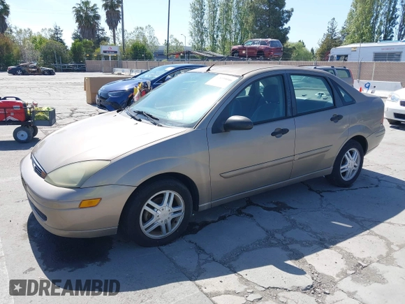 2004 Ford Focus SE with VIN 1FAFP34354W103841, listed as a IAAI auction lot 42099046 with 112,231 mi miles and . Bid and sale history available at DreamBid. Image 2.