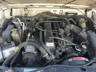 1999 Jeep Cherokee Sport with VIN 1J4FT68S6XL578679, listed as a Copart auction lot 76697394 with 196,110 mi miles and Salvage title. Bid and sale history available at DreamBid. Image 12.