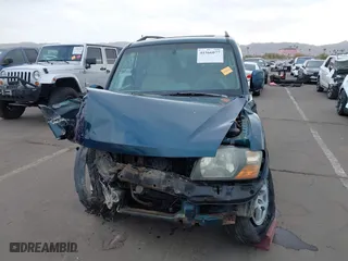 2002 Mitsubishi Montero LTD with VIN JA4MW51RX2J040586, listed as a IAAI auction lot 41566077 with 149,851 mi miles. Bid and sale history available at carsss.com. Image 12.