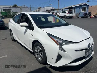 2018 Toyota Prius Two with VIN JTDKARFU6J3060322, listed as a IAAI auction lot 42273299 with 113,523 mi miles and . Bid and sale history available at DreamBid. Image 1.