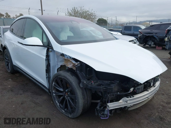 2023 Tesla Model X with VIN 7SAXCBE54PF384403, listed as a IAAI auction lot 40947187 with 16,881 mi miles and . Bid and sale history available at DreamBid. Image 1.