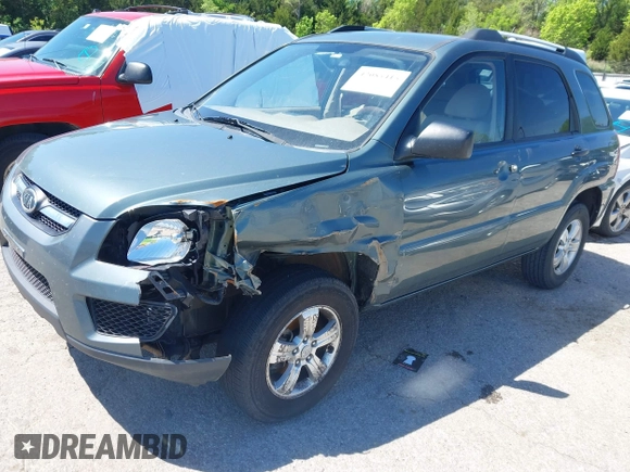 2009 Kia Sportage LX with VIN KNDJF724497602223, listed as a IAAI auction lot 42085415 with 91,105 mi miles. Bid and sale history available at carsss.com. Image 2.